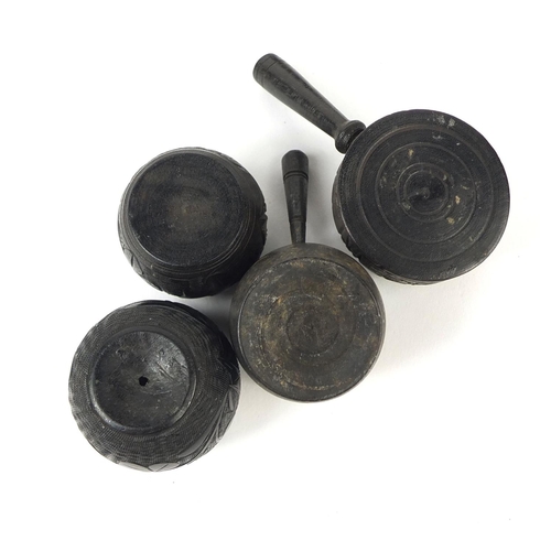 11 - Collection of Irish Bog oak including napkin rings, barrels and saucepans, mostly decorated with sha... 