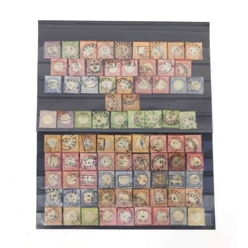 247 - Collection of 19th century German stamps including twenty six small shields and fifty four large shi... 