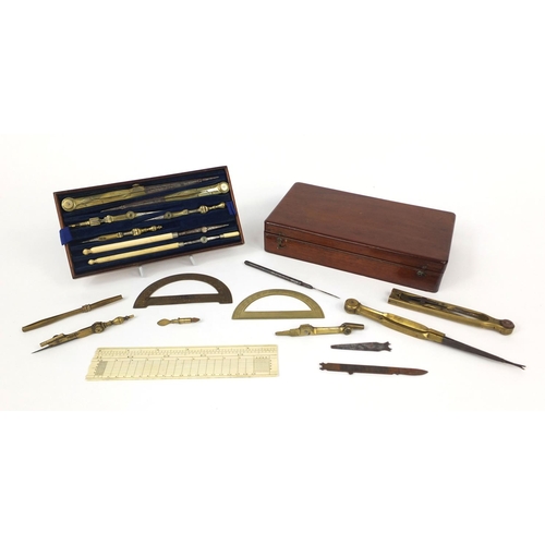 144 - 19th century mahogany cased drawing instrument set containing brass protractors and an ivory ruler, ... 