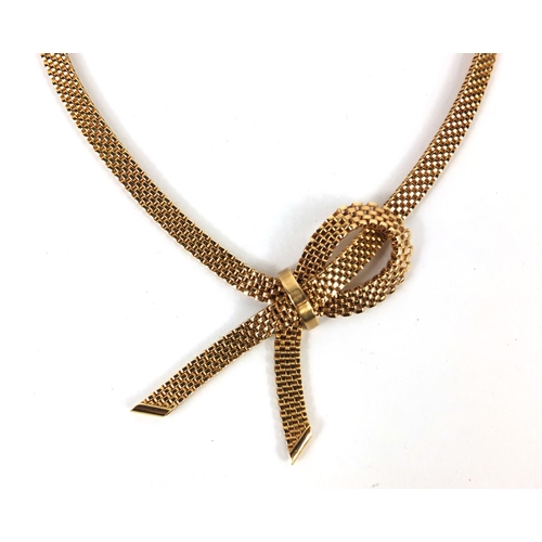 747 - Good quality stylish 9ct gold bow design necklace with flat links, 40cm long, approximate weight 41.... 