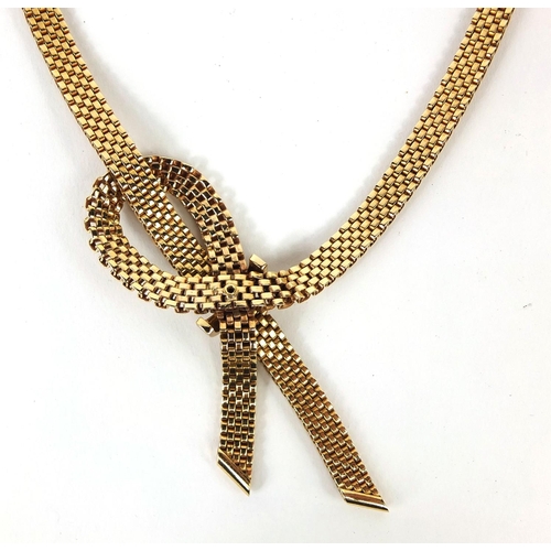 747 - Good quality stylish 9ct gold bow design necklace with flat links, 40cm long, approximate weight 41.... 