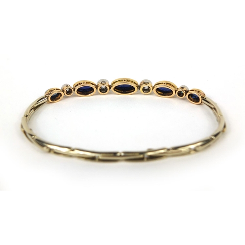738 - Unmarked white metal cabochon sapphire and diamond expandable bracelet, set with five graduated sapp... 
