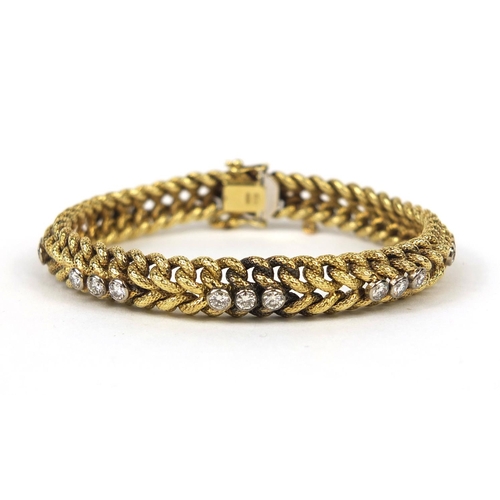 745 - 14ct gold rope design diamond bracelet set with twenty four diamonds, C & F makers mark, approximate... 