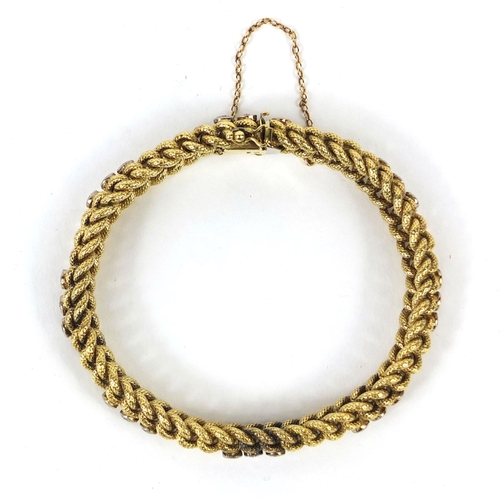 745 - 14ct gold rope design diamond bracelet set with twenty four diamonds, C & F makers mark, approximate... 