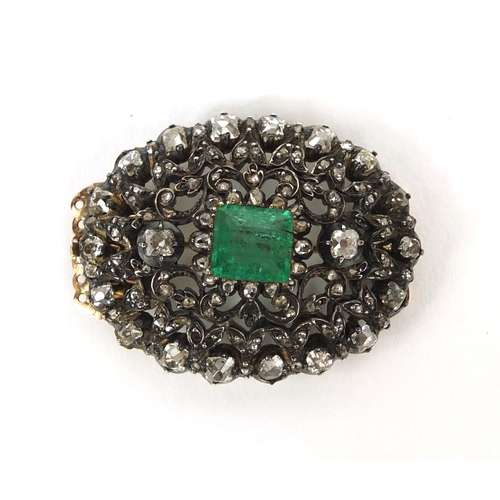 743 - Late 19th/early 20th century Russian diamond brooch set with a central emerald, clasp fitting to the... 