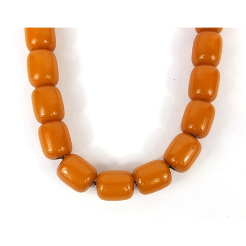 832 - Butterscotch amber coloured bead necklace, 50cm long, approximate weight  63.8g