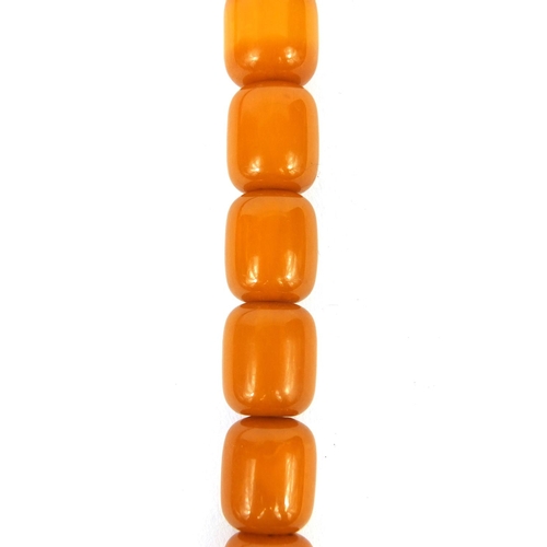 832 - Butterscotch amber coloured bead necklace, 50cm long, approximate weight  63.8g