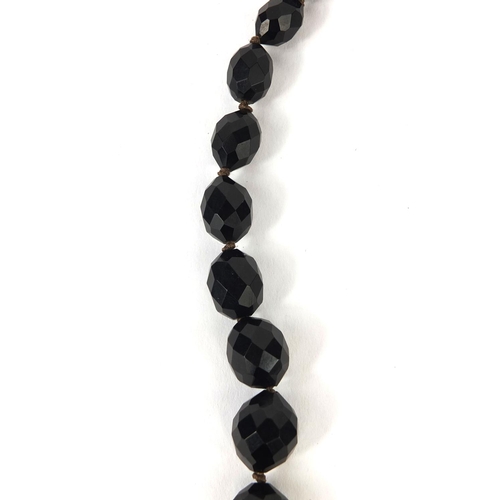 836 - Faceted bead jet design necklace, 84cm long, approximate weight 58.6g