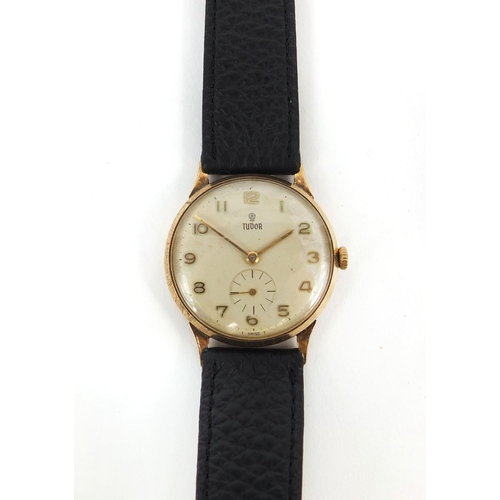 848 - Gentleman's 9ct gold Rolex Tudor wristwatch and black leather strap, 3.1cm diameter excluding the cr... 