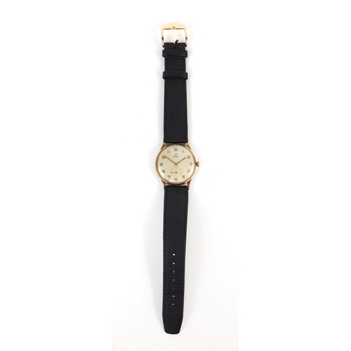 848 - Gentleman's 9ct gold Rolex Tudor wristwatch and black leather strap, 3.1cm diameter excluding the cr... 