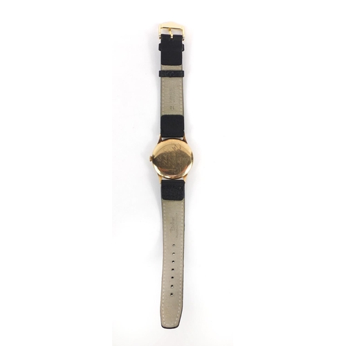 848 - Gentleman's 9ct gold Rolex Tudor wristwatch and black leather strap, 3.1cm diameter excluding the cr... 