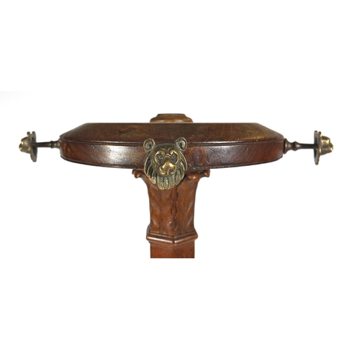 2026 - Mahogany swivelling coat stand with lion mask hooks, 169cm high