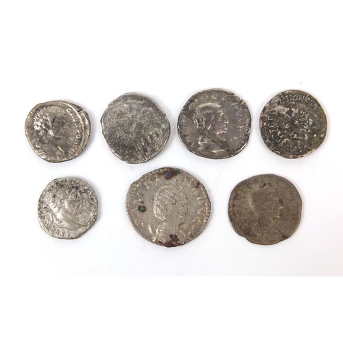 276 - Group of seven silver coloured metal Roman coins, the largest approximately 2.3cm in diameter, appro... 