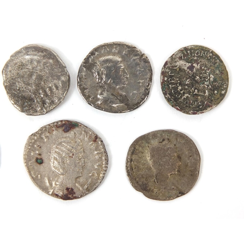 276 - Group of seven silver coloured metal Roman coins, the largest approximately 2.3cm in diameter, appro... 