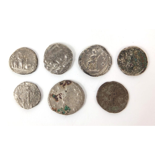 276 - Group of seven silver coloured metal Roman coins, the largest approximately 2.3cm in diameter, appro... 