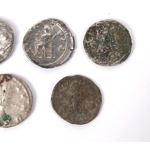 276 - Group of seven silver coloured metal Roman coins, the largest approximately 2.3cm in diameter, appro... 