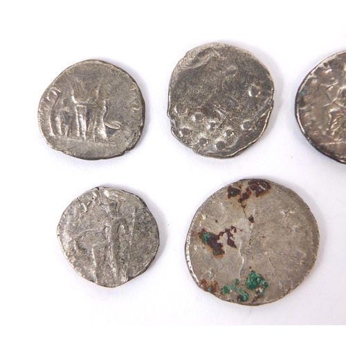 276 - Group of seven silver coloured metal Roman coins, the largest approximately 2.3cm in diameter, appro... 