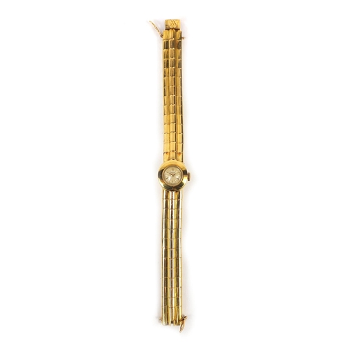 857 - Boxed ladies 18ct gold Omega wristwatch with 18ct gold strap, the movement no.14091129, approximate ... 