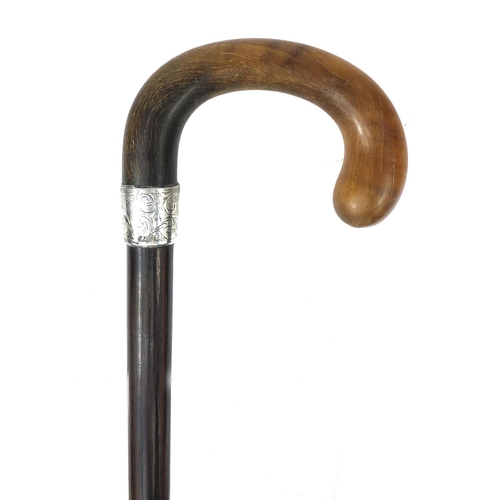 27 - Exotic wood walking stick with rhino horn handle, silver collar engraved 'presented to Mr John McIve... 