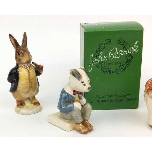 2053 - Three Beswick Beatrix Potter figures, Mrs Tiggy-Winkle with gold back stamp, Mr Benjamin Bunny with ... 