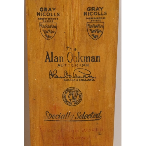 162 - Three vintage autographed cricket bats including the Australian 1964 team, Glamorgan, Middlesex, Sur... 