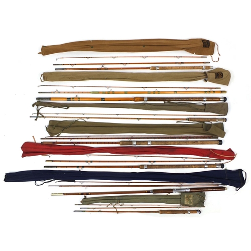 170 - Collection of vintage cane fishing rods including Sealey examples, with canvas cases