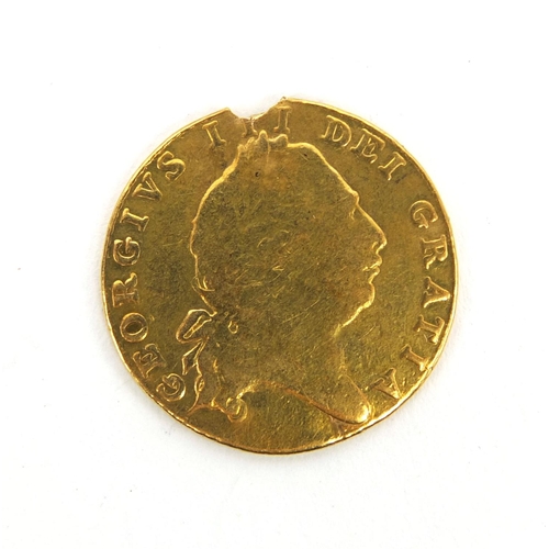 251 - George III 1801 gold half guinea, approximately 2cm in diameter, approximate weight 4.1g