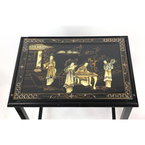 2032 - Nest of four Oriental lacquered occasional tables, each inlaid and hand painted with figures, the la... 