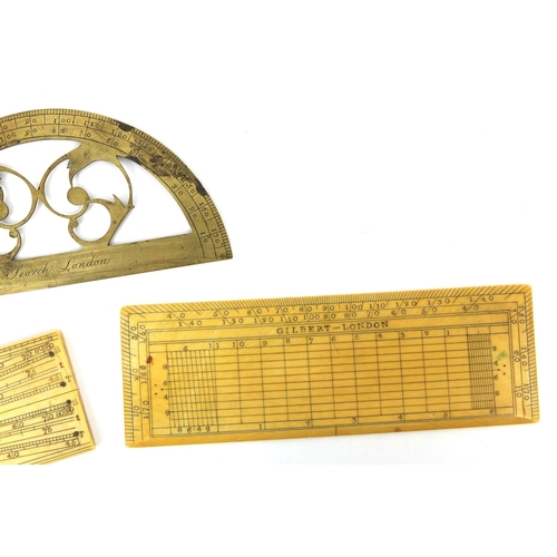 145 - 19th century scientific instruments comprising two Gilbert of London ivory rules including a folding... 