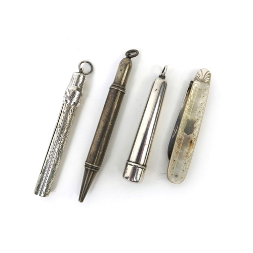 80 - Group of silver items comprising two silver propelling pencils, Mother of Pearl flanked silver blade... 