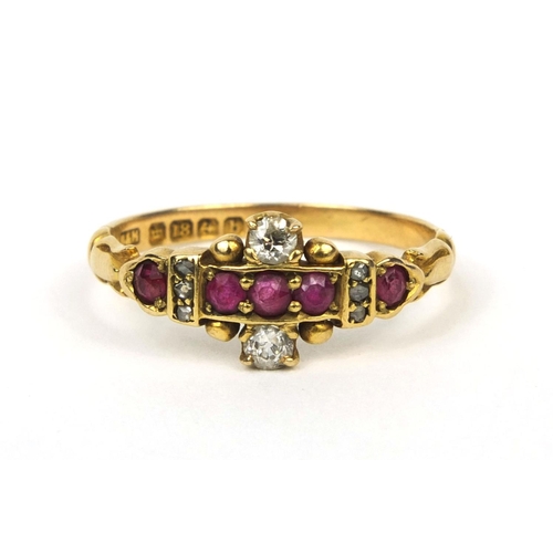 744 - 18ct gold ruby and diamond ring set with five rubies and eight diamonds, size M, approximate weight ... 