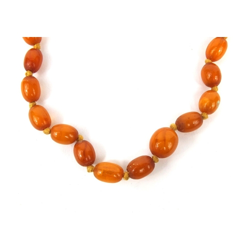 830 - Butterscotch amber coloured bead necklace, 50cm long, approximate weight 14.8g