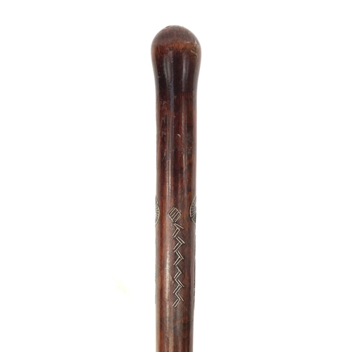 38 - Tribal interest exotic wood walking stick with stylised silvered inlay possibly from New Zealand, 94... 
