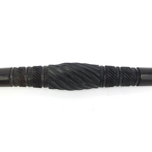 35 - Ebonised walking stick with carved handle in the form of a shoe, 87cm long