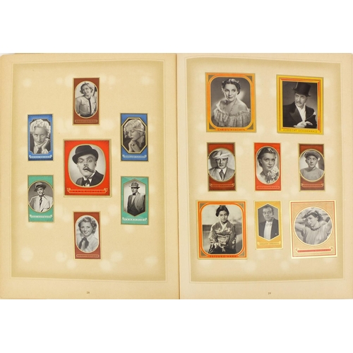 227 - Two albums of Bunte Filmbilder film star cards housed in cardboard sleeves, 30cm x 23cm