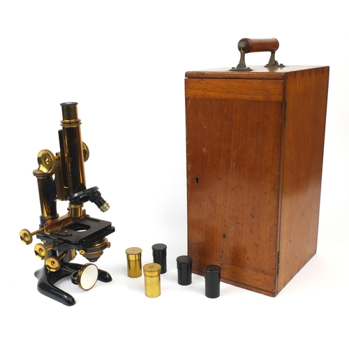 152 - W Watson & Sons of London 'Bactil' microscope together with fitted mahogany carrying case and access... 