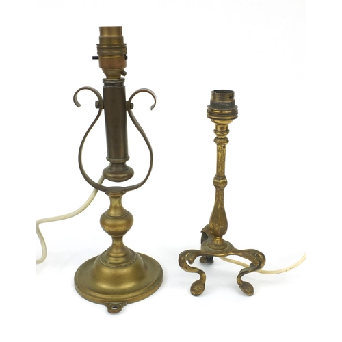 126 - Two brass lamps comprising a pullman railway carriage lamp and a ships gimbal lamp, the tallest 31cm... 