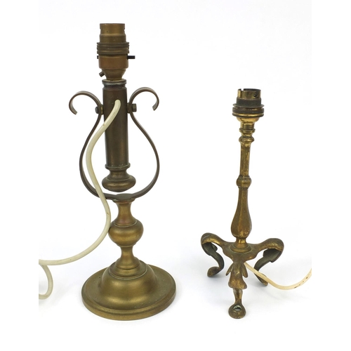 126 - Two brass lamps comprising a pullman railway carriage lamp and a ships gimbal lamp, the tallest 31cm... 