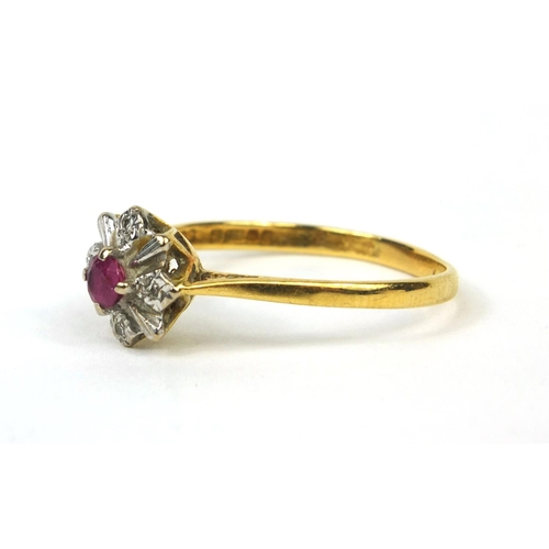 2508 - 18ct gold ruby and diamond ring set with a ruby surrounded by four diamonds, size T, approximate wei... 