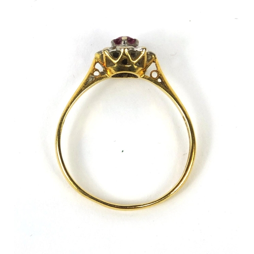 2508 - 18ct gold ruby and diamond ring set with a ruby surrounded by four diamonds, size T, approximate wei... 