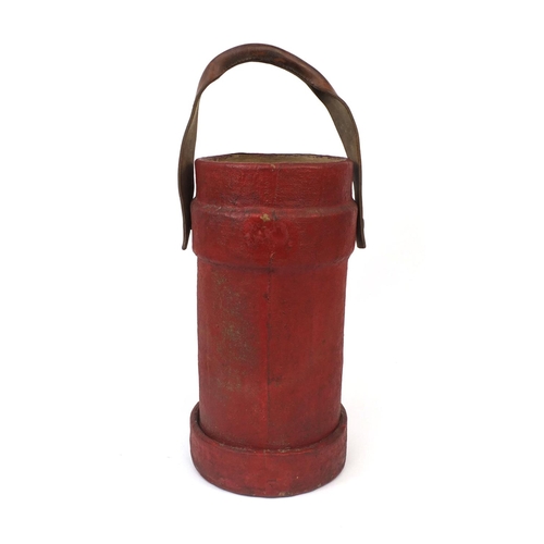 123 - Red painted canvas fire bucket with Heraldic crest and brown leather carrying handle, 43cm high