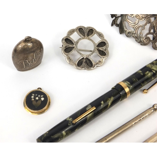 74 - Group of objects including a silver nurses belt buckle, Swan marbleised fountain pen with 14ct gold ... 