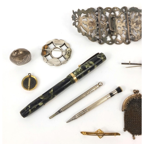 74 - Group of objects including a silver nurses belt buckle, Swan marbleised fountain pen with 14ct gold ... 