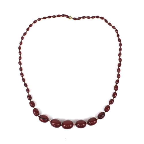 834 - Cherry amber coloured bead necklace, 100cm long, approximate weight 93.6g