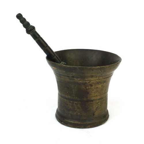 131 - Antique bronze pestle and mortar, 10.5cm high