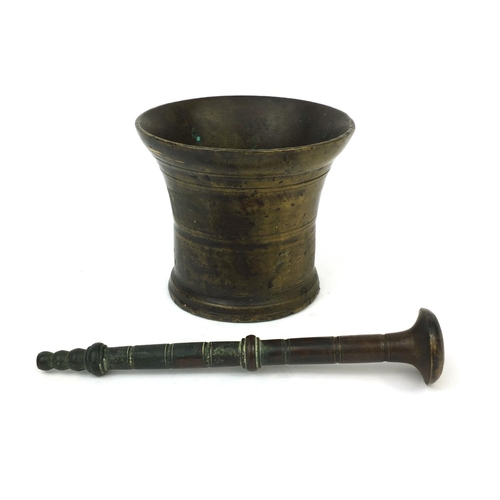 131 - Antique bronze pestle and mortar, 10.5cm high