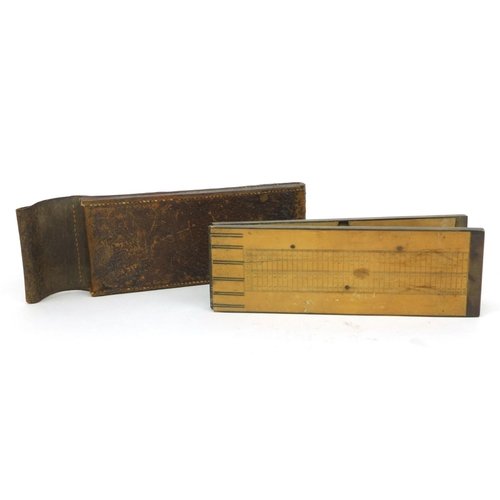 142 - Troughton & Sims of London brass and boxwood folding ruler with inset clinometer and brown leather p... 