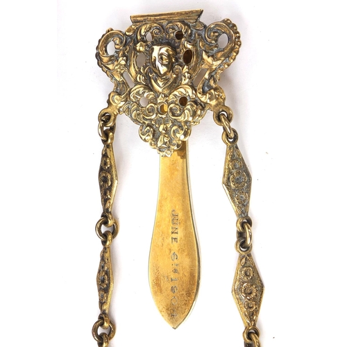 57 - Silver gilt spectacle case with velvet lined interior and engraved floral decoration on a chatelaine... 