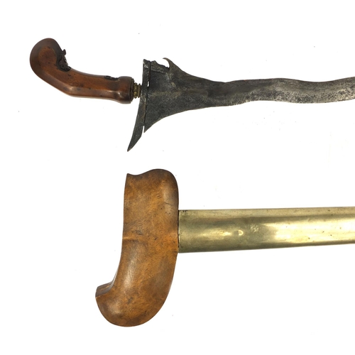 335 - Middle Eastern Kris dagger, with finely carved handle, 50cm long