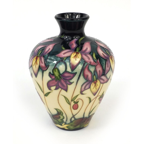 2059 - Boxed limited edition Moorcroft pottery Queens Meadow patterned vase, designed by RJ Bishop, factory... 